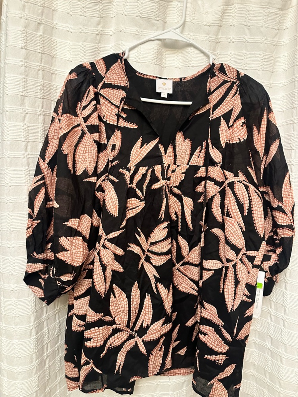 J. Marie blouse. Has a black lining in it so not to thin. 100% cotton.